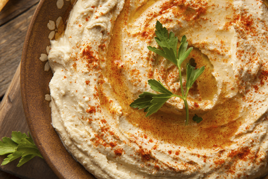 Healthy Homemade Creamy Hummus with Olive Oil and Pita Chips