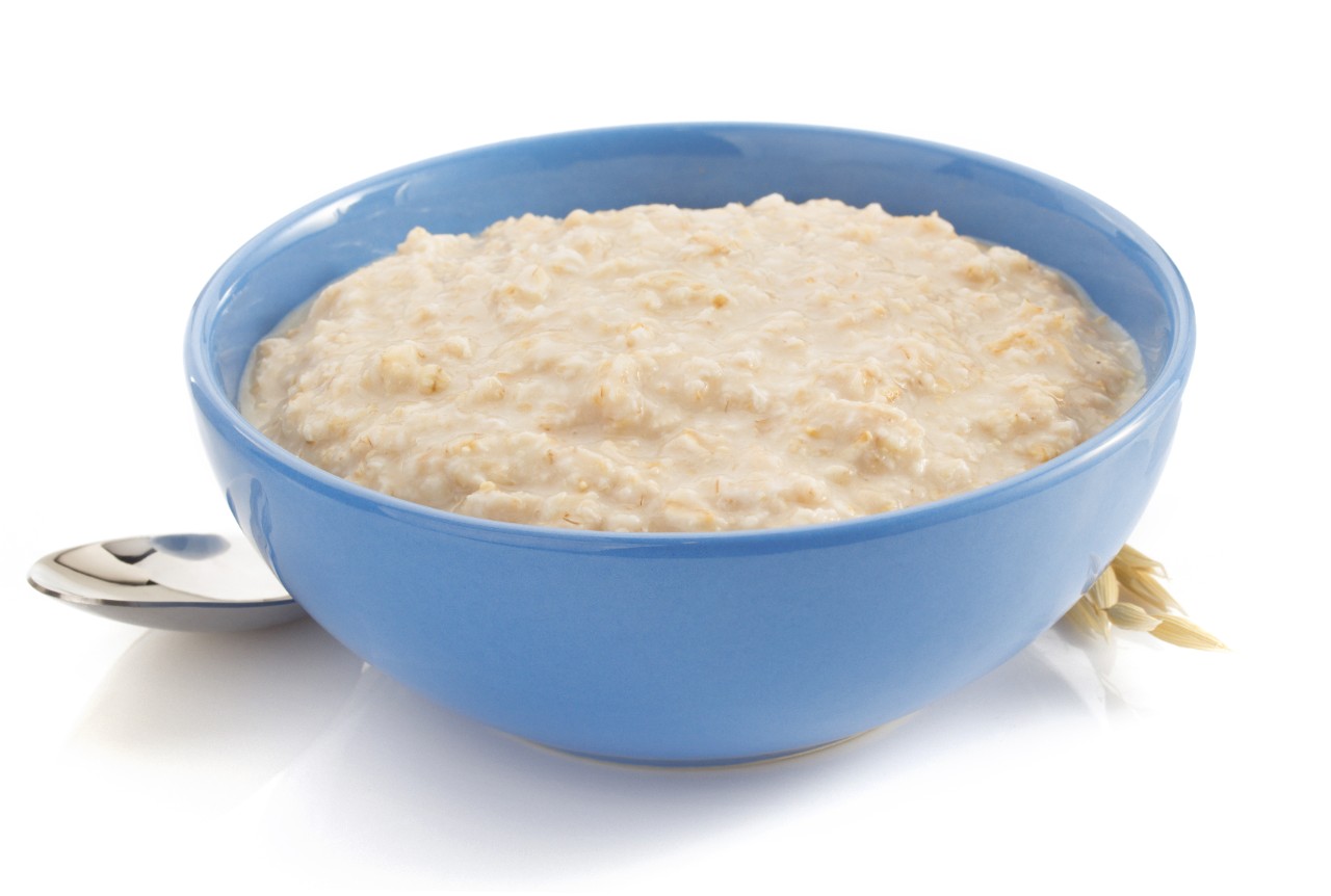 bowl of oatmeal isolated on white background