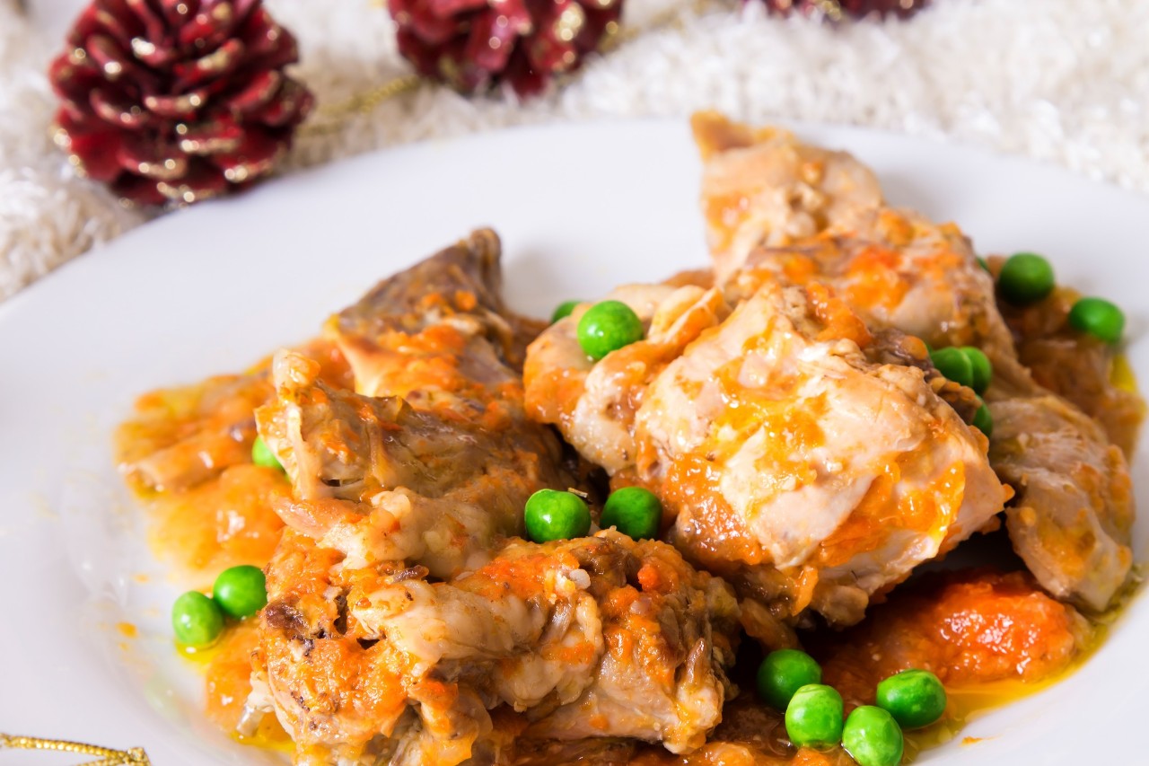 Christmas food, stewed rabbit with carrots and peas