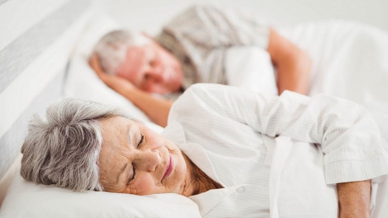 elderly couple sleeping